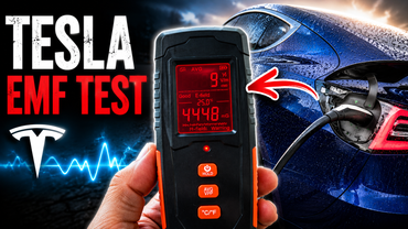 Tesla Model 3 EMF test showing an EMF meter inside a blue Tesla while the electric vehicle is plugged in and charging.