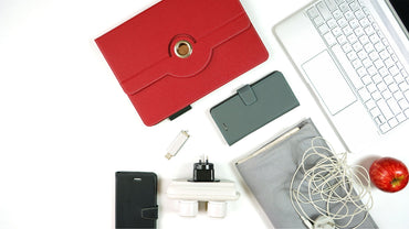 Phone shield stickers and everyday electronic devices on white
