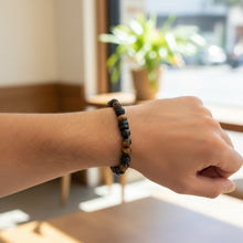 EMF Protection Men’s Lava Bead Bracelet – Tiger with tiger eye stones worn on wrist