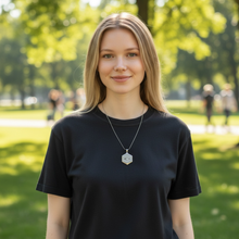 Woman wearing stainless steel EMF protection necklace octagon pendant