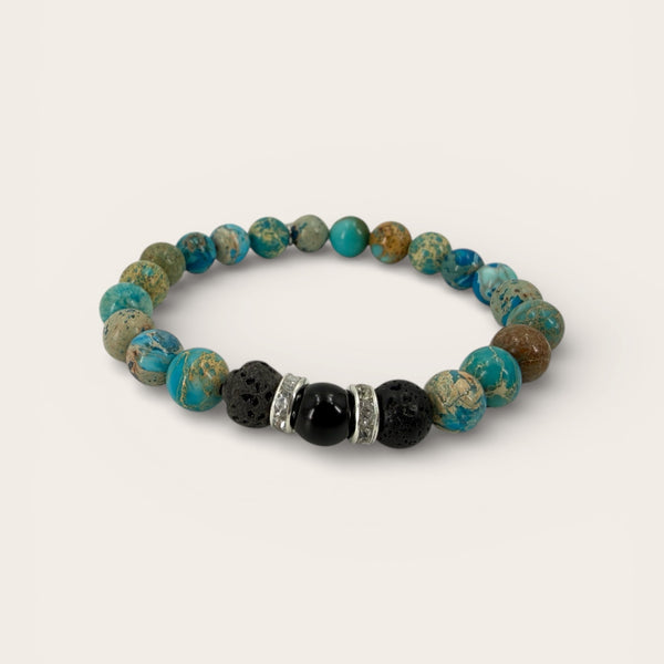 Earthy Turquoise EMF Protection Beaded Bracelet with lava stones and harmonizing EMF bead on white background