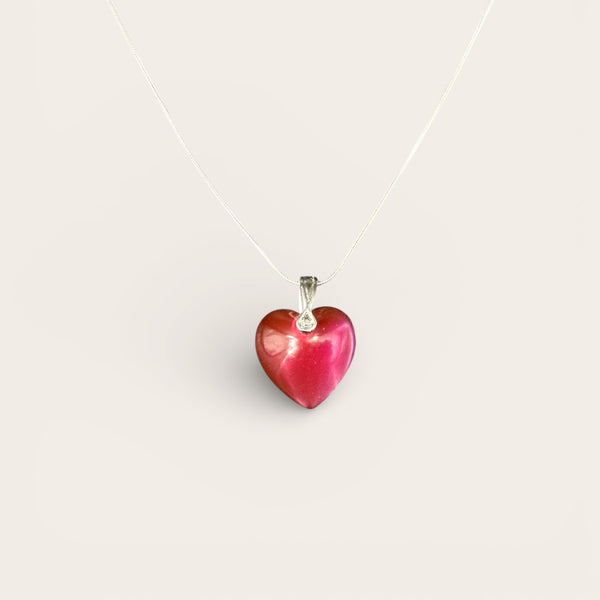 Small red heart EMF protection necklace with delicate heart pendant on silver chain