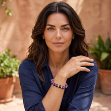 Woman wearing the Amethyst EMF Protection Beaded Bracelet