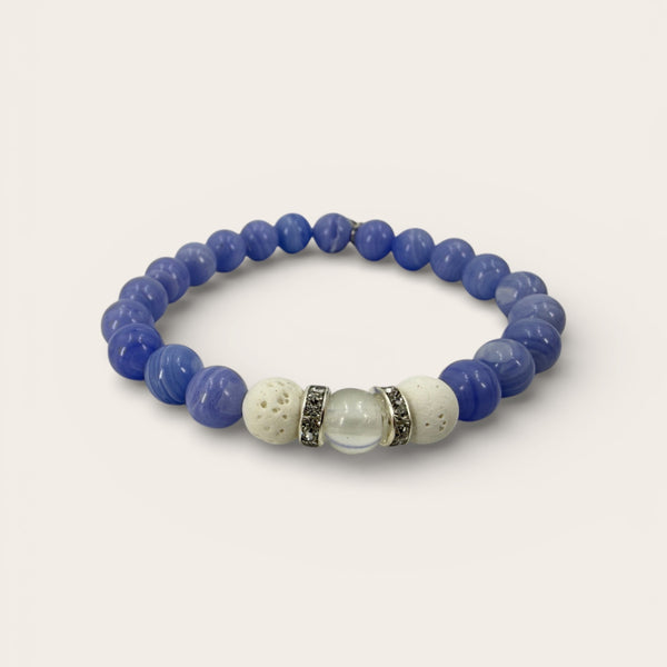 Azureveil EMF protection beaded bracelet with blue stone beads, white lava stones, and clear EMF harmonizing resin bead