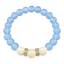 Azureveil EMF protection beaded bracelet with light blue beads, white lava stones and gold crystal spacers on white background
