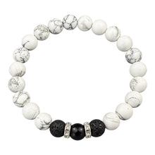 Black and White EMF Protection Beaded Bracelet with white beads, black lava stones and silver crystal spacers on a white background