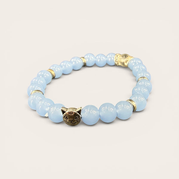 Blue Cat Charm EMF Protection Bracelet with light blue beaded design and decorative cat centerpiece for cat lovers.
