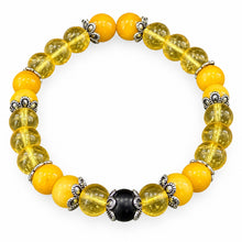 Citrine EMF Protection Beaded Bracelet — golden yellow citrine beads with translucent honey beads, black center bead and silver spacers on white background