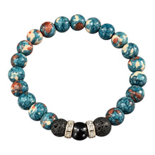 Earthbound EMF protection beaded bracelet with marbled teal and cream stone beads, black lava stones and silver crystal spacers on white background