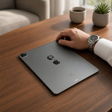 EMF Mega Shield for Tablets - Silver Cross on the back of an iPad on a home office desk