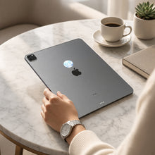 EMF Mega Shield for Tablets - Wings of Peace on the back of an iPad on a cafe table