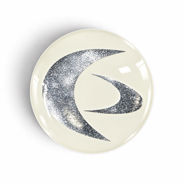 Silver on White EMF Mini Shield – round phone sticker with a silver swirl design on a clean white background that harmonizes EMF from your phone