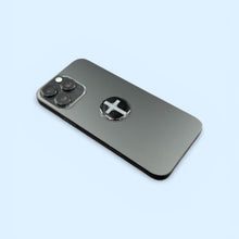 Silver Cross Mega Shield EMF protection sticker applied to smartphone