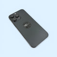 EMF Protection Mega Shield Silver on Black mounted on back of smartphone for radiation protection