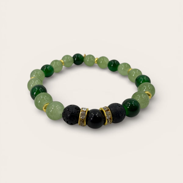 Evergreen EMF Protection Beaded Bracelet for women featuring green beads, lava stones, and gold accents on a white background