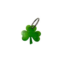 Perfectly Imperfect Shamrock EMF Protection Keychain in glitter green with 240+ encoded resonant frequencies for portable EMF protection