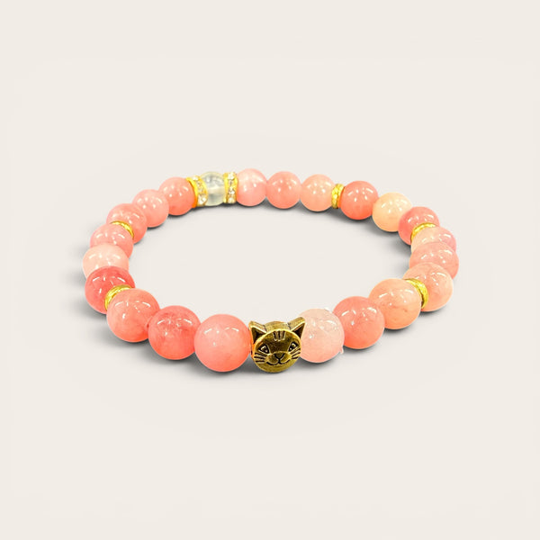 Pink Cat Charm EMF Protection Bracelet with gold cat centerpiece and pink gemstone-inspired beads for everyday wearable protection.