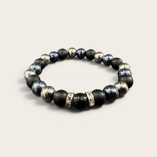 Ultimate EMF Protection Beaded Bracelet featuring matte black and metallic beads with three proprietary technology beads containing 240+ resonant frequencies.