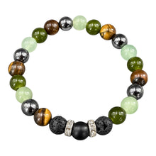 Wildstone EMF protection beaded bracelet with green, mint, tiger eye and hematite beads, black lava stones and silver crystal spacers on white background